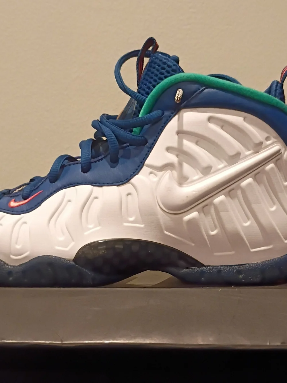 Nike Kids White and Blue Sneakers with Green and Orange Accents